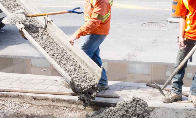 Guys working on a new concrete driveway in Adelaide
